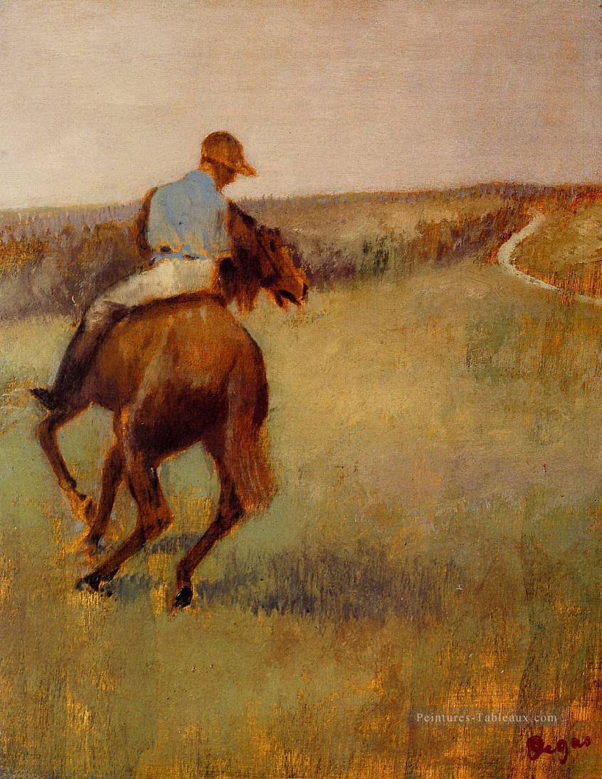 jockey en bleu sur un cheval marron Edgar Degas Peintures à l'huile